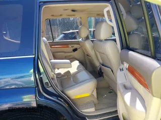 2005 Lexus GX with VIN JTJBT20XX50081621, listed as a IAAI auction lot 41661384 with 208,071 mi miles. Bid and sale history available at carsss.com. Image 8.