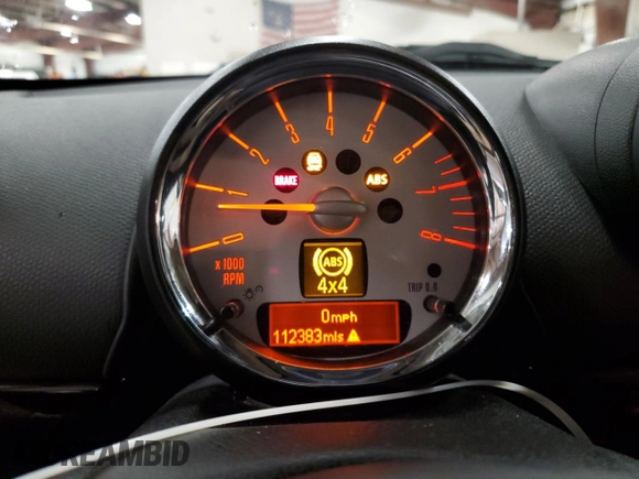 2013 MINI Countryman S ALL4 with VIN WMWZC5C5XDWM16477, listed as a Copart auction lot 51666385 with 112,383 mi miles and Salvage title. Bid and sale history available at DreamBid. Image 9.