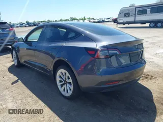 2023 Tesla Model 3 with VIN 5YJ3E1EAXPF617388, listed as a IAAI auction lot 42218748 with Not provided miles and . Bid and sale history available at DreamBid. Image 3.