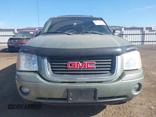 2003 GMC Envoy SLT with VIN 1GKDT13S932373739, listed as a IAAI auction lot 42122017 with 155,963 mi miles. Bid and sale history available at carsss.com. Image 6.