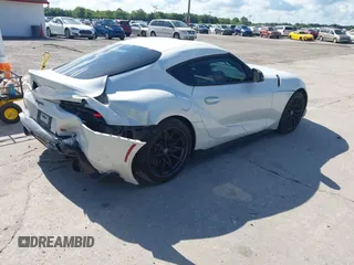 2024 Toyota Supra 3.0 with VIN WZ1DB0G02RW066224, listed as a IAAI auction lot 42243491 with 20,672 mi miles and . Bid and sale history available at DreamBid. Image 4.