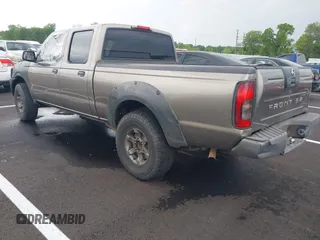 2003 Nissan Frontier XE z VIN 1N6ED29X93C444600, wystawiony jako IAAI lot #42097322 z przebiegiem 317 599 mil mil oraz . Historia ofert i sprzedaży dostępna na DreamBid. Obrazek 3.
