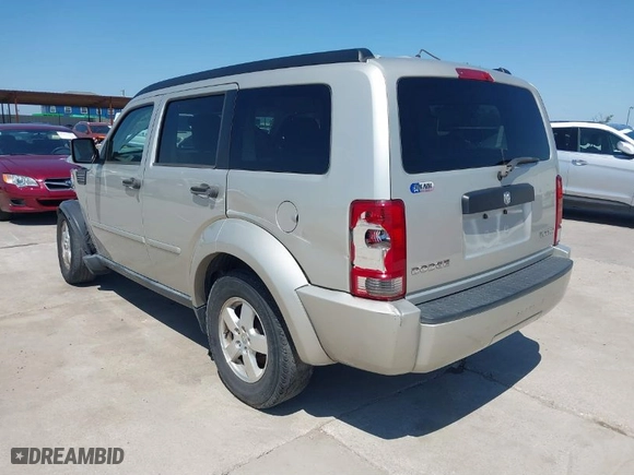 2009 Dodge Nitro SE with VIN 1D8GT28K99W513413, listed as a IAAI auction lot 39462494 with 196,456 mi miles. Bid and sale history available at carsss.com. Image 3.