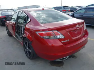 2009 Mazda 6 S Grand Touring with VIN 1YVHP82B895M20692, listed as a IAAI auction lot 42134552 with 264,332 mi miles and . Bid and sale history available at DreamBid. Image 3.