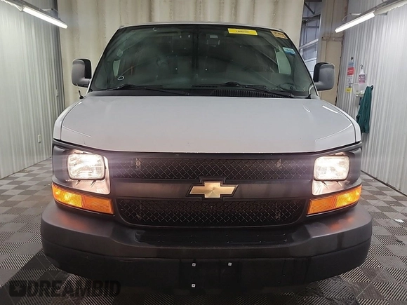2014 Chevrolet Express Cargo z VIN 1GCSGAFXXE1162573, wystawiony jako IAAI lot #42547277 z przebiegiem 230 224 mil mil oraz . Historia ofert i sprzedaży dostępna na DreamBid. Obrazek 22.