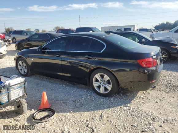 2012 BMW 5 Series 528i with VIN WBAXG5C55CDY30322, listed as a Copart auction lot 84326974 with 210,301 mi miles and Clean Title. Bid and sale history available at carsss.com. Image 2.