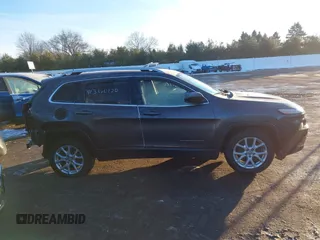 2015 Jeep Cherokee Latitude z VIN 1C4PJLCB9FW525798, wystawiony jako IAAI lot #41360120 z przebiegiem 130 219 mil mil oraz . Historia ofert i sprzedaży dostępna na DreamBid. Obrazek 14.
