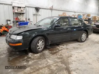 1998 Nissan Maxima GXE z VIN JN1CA21A1WM801330, wystawiony jako Copart lot #86407754 z przebiegiem 199 156 mil mil oraz Nie do naprawy • Non repairable. Historia ofert i sprzedaży dostępna na DreamBid. Obrazek 1.