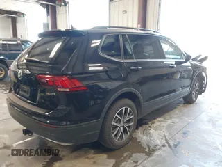 2021 Volkswagen Tiguan S with VIN 3VV0B7AX8MM020189, listed as a IAAI auction lot 42615767 with 70,294 mi miles and . Bid and sale history available at DreamBid. Image 4.