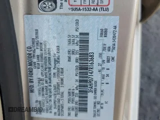 2007 Ford Fusion SE with VIN 3FAHP07147R163683, listed as a Copart auction lot 52719175 with 129,943 mi miles and Salvage Title. Bid and sale history available at DreamBid. Image 12.