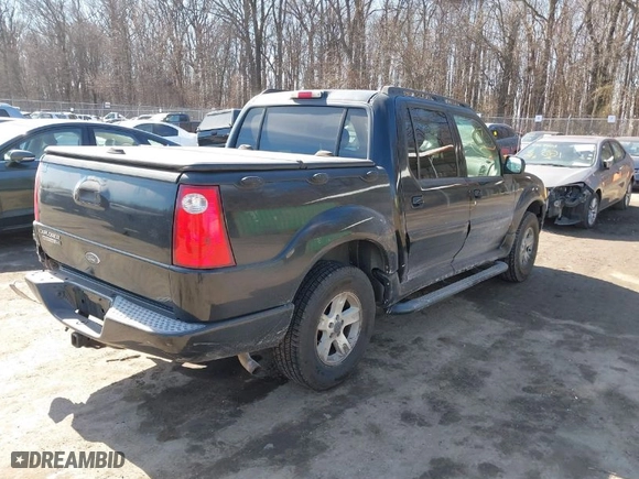 2005 Ford Explorer Sport Trac XLS with VIN 1FMZU67K95UB68186, listed as a IAAI auction lot 41653987 with 147,935 mi miles. Bid and sale history available at carsss.com. Image 4.