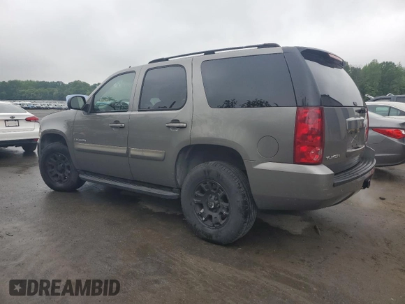 2007 GMC Yukon SLT with VIN 1GKFK13007J117446, listed as a Copart auction lot 55974665 with 204,785 mi miles and Salvage title. Bid and sale history available at DreamBid. Image 2.