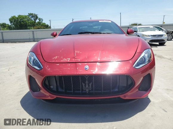 2018 Maserati GranTurismo Sport с VIN ZAM45VLA5J0254000, выставлен на аукционе Copart как лот 57055945 с пробегом 20 301 миль миль и Списание • Salvage title. История ставок и продаж доступна на DreamBid. Изображение 5.