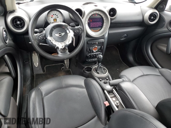 2012 MINI Countryman S with VIN WMWZC3C57CWL86423, listed as a Copart auction lot 57584195 with 102,184 mi miles and Salvage title. Bid and sale history available at DreamBid. Image 8.