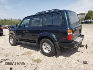 1995 Toyota Land Cruiser z VIN JT3DJ81W9S0112464, wystawiony jako Copart lot #49925395 z przebiegiem 215 698 mil mil oraz Czysty tytuł • Clean title. Historia ofert i sprzedaży dostępna na DreamBid. Obrazek 2.