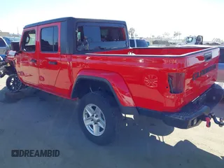 2022 Jeep Gladiator Willys Sport z VIN 1C6HJTAG0NL180848, wystawiony jako IAAI lot #41778129 z przebiegiem Nie podano mil oraz . Historia ofert i sprzedaży dostępna na DreamBid. Obrazek 3.