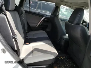2016 Toyota RAV4 Limited z VIN JTMDJREVXGD054156, wystawiony jako Copart lot #56239415 z przebiegiem 127 849 mil mil oraz Szkoda całkowita • Salvage title. Historia ofert i sprzedaży dostępna na DreamBid. Obrazek 11.