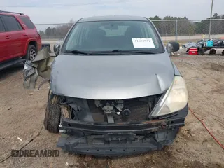 2009 Nissan Versa S with VIN 3N1BC13E59L407294, listed as a IAAI auction lot 41692951 with 250,029 mi miles and . Bid and sale history available at DreamBid. Image 12.