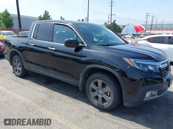 2020 Honda Ridgeline RTL-E with VIN 5FPYK3F70LB009376, listed as a IAAI auction lot 42488529 with 30,932 mi miles and . Bid and sale history available at DreamBid. Image 1.