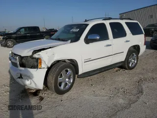 2013 Chevrolet Tahoe LTZ с VIN 1GNSCCE08DR102648, выставлен на аукционе Copart как лот 49677345 с пробегом 226 528 миль миль и Списание • Salvage title. История ставок и продаж доступна на DreamBid. Изображение 1.
