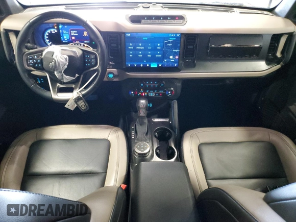 2023 Ford Bronco z VIN 1FMEE5DP1PLB74756, wystawiony jako Copart lot #46458355 z przebiegiem 23 744 mil mil oraz Szkoda całkowita • Salvage title. Historia ofert i sprzedaży dostępna na DreamBid. Obrazek 8.