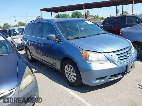 2010 Honda Odyssey EX-L with VIN 5FNRL3H64AB071603, listed as a IAAI auction lot 42084026 with 199,753 mi miles. Bid and sale history available at carsss.com. Image 1.