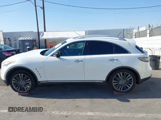 2017 Infiniti QX70 z VIN JN8CS1MU1HM141873, wystawiony jako IAAI lot #42345889 z przebiegiem 65 090 mil mil oraz . Historia ofert i sprzedaży dostępna na DreamBid. Obrazek 14.