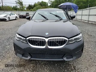 2019 BMW 3 Series 330i xDrive with VIN 3MW5R7J52K8A04913, listed as a Copart auction lot 58498355 with 59,091 mi miles and Salvage title. Bid and sale history available at DreamBid. Image 5.
