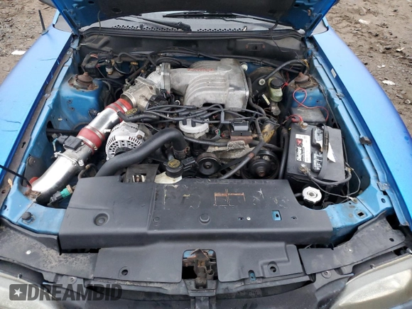 1994 Ford Mustang z VIN 1FALP45T2RF214782, wystawiony jako Copart lot #83860474 z przebiegiem 164 464 mil mil oraz Szkoda całkowita • Salvage title. Historia ofert i sprzedaży dostępna na DreamBid. Obrazek 11.
