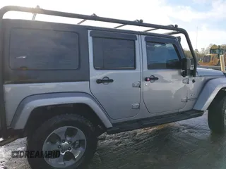 2016 Jeep Wrangler Unlimited 75th Anniversary with VIN 1C4HJWEGXGL149548, listed as a IAAI auction lot 41918007 with 254,655 mi miles. Bid and sale history available at carsss.com. Image 12.