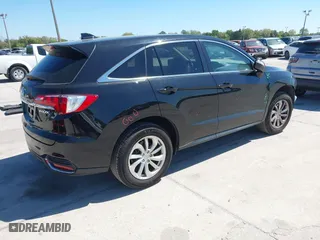 2018 Acura RDX w/Technology Pkg with VIN 5J8TB3H58JL008583, listed as a IAAI auction lot 41761974 with 105,984 mi miles. Bid and sale history available at carsss.com. Image 4.