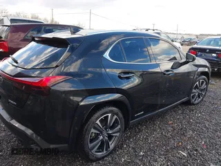 2021 Lexus UX 250h with VIN JTHX9JBHXM2042844, listed as a IAAI auction lot 41213573 with 31,650 mi miles and . Bid and sale history available at DreamBid. Image 4.
