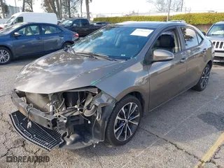 2019 Toyota Corolla L with VIN 5YFBURHEXKP922883, listed as a IAAI auction lot 41702924 with 99,166 mi miles. Bid and sale history available at carsss.com. Image 18.