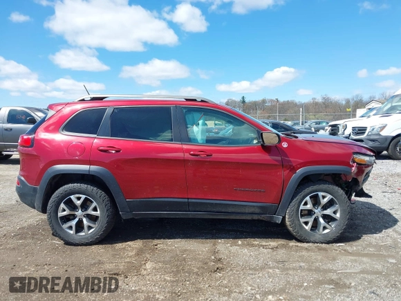2015 Jeep Cherokee Trailhawk with VIN 1C4PJMBS0FW728361, listed as a IAAI auction lot 41978853 with 123,127 mi miles. Bid and sale history available at carsss.com. Image 13.