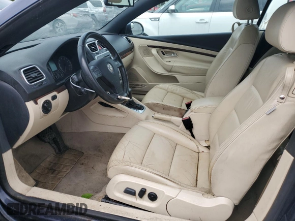 2007 Volkswagen Eos 2.0T with VIN WVWFA71F17V000623, listed as a Copart auction lot 54840164 with 135,617 mi miles and Salvage Title. Bid and sale history available at DreamBid. Image 7.