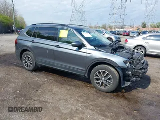 2019 Volkswagen Tiguan SE with VIN 3VV2B7AX5KM198454, listed as a IAAI auction lot 42033410 with 64,381 mi miles and . Bid and sale history available at DreamBid. Image 1.
