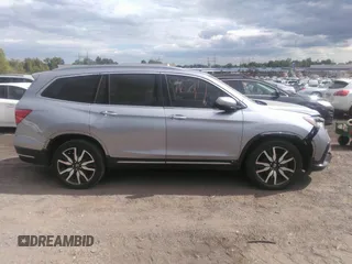 2022 Honda Pilot Touring 7-Passenger with VIN 5FNYF6H60NB013465, listed as a IAAI auction lot 40139627 with 78,161 mi miles. Bid and sale history available at carsss.com. Image 13.