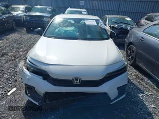 2023 Honda Civic Sport with VIN 2HGFE2F54PH512362, listed as a IAAI auction lot 41401479 with 12,672 mi miles and . Bid and sale history available at DreamBid. Image 12.