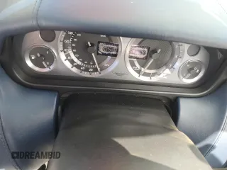 2006 Aston Martin DB9 z VIN SCFAB02A26GB04627, wystawiony jako Copart lot #68314504 z przebiegiem Nie podano mil oraz Szkody całkowita. Historia ofert i sprzedaży dostępna na DreamBid. Obrazek 9.