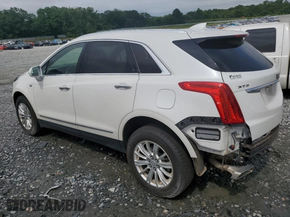 2018 Cadillac XT5 FWD with VIN 1GYKNARS1JZ222767, listed as a Copart auction lot 57989015 with 33,464 mi miles and Salvage title. Bid and sale history available at DreamBid. Image 2.