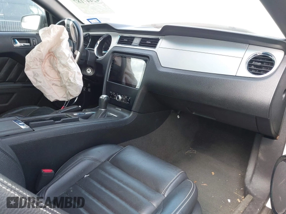 2012 Ford Mustang Premium with VIN 1ZVBP8AM2C5263373, listed as a IAAI auction lot 42447187 with 131,159 mi miles and . Bid and sale history available at DreamBid. Image 5.