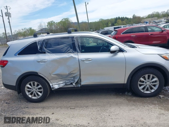 2016 Kia Sorento LX with VIN 5XYPG4A35GG048897, listed as a IAAI auction lot 41986578 with 161,157 mi miles. Bid and sale history available at carsss.com. Image 13.