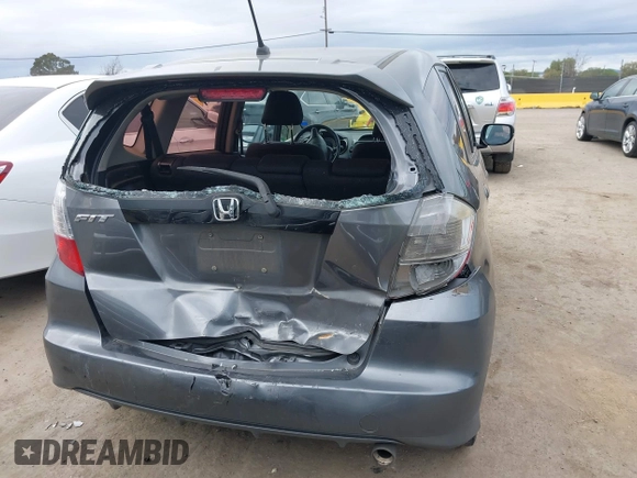 2012 Honda Fit Sport with VIN JHMGE8H50CC035136, listed as a IAAI auction lot 41657267 with 331,783 mi miles. Bid and sale history available at carsss.com. Image 16.