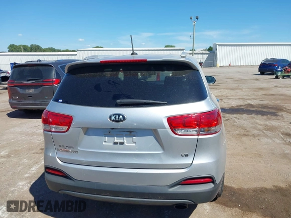 2018 Kia Sorento LX with VIN 5XYPG4A5XJG394663, listed as a IAAI auction lot 40222497 with 125,838 mi miles and . Bid and sale history available at DreamBid. Image 16.