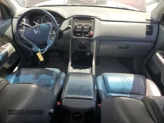 2007 Honda Pilot EX-L z VIN 5FNYF18577B007448, wystawiony jako Copart lot #58247885 z przebiegiem 167 628 mil mil oraz Czysty tytuł • Clean title. Historia ofert i sprzedaży dostępna na DreamBid. Obrazek 8.