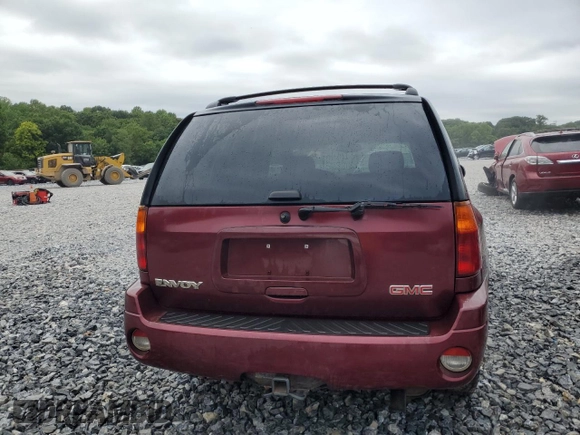 2004 GMC Envoy SLT with VIN 1GKDT13S342336784, listed as a Copart auction lot 66704184 with 169,431 mi miles and Salvage Title. Bid and sale history available at DreamBid. Image 6.