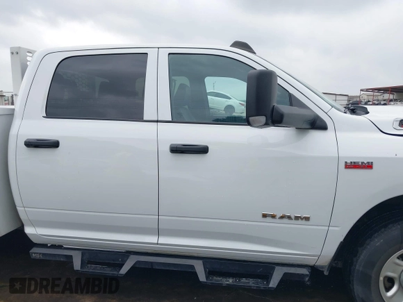 2022 Ram 2500 Tradesman z VIN 3C7WR4HJ1NG424247, wystawiony jako IAAI lot #41943490 z przebiegiem 56 423 mil mil oraz . Historia ofert i sprzedaży dostępna na DreamBid. Obrazek 13.