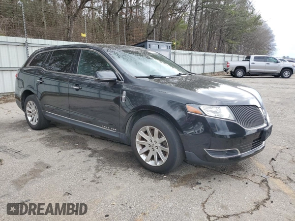 2015 Lincoln MKT with VIN 2LMHJ5NK9FBL01560, listed as a Copart auction lot 44083555 with 104,869 mi miles and Clean Title. Bid and sale history available at DreamBid. Image 4.