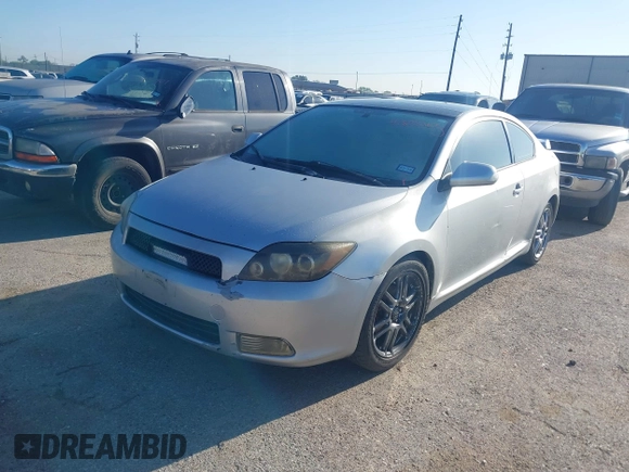 2008 Scion tC Spec with VIN JTKDE167280242922, listed as a IAAI auction lot 41872367 with 167,702 mi miles. Bid and sale history available at carsss.com. Image 2.