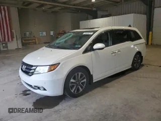 2016 Honda Odyssey Touring Elite with VIN 5FNRL5H91GB070424, listed as a Copart auction lot 55583075 with 115,709 mi miles and Salvage Title. Bid and sale history available at DreamBid. Image 1.